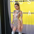 Miley Cyrus in a daring custom Versace