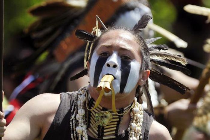 Native American student sues school district over right to wear feather