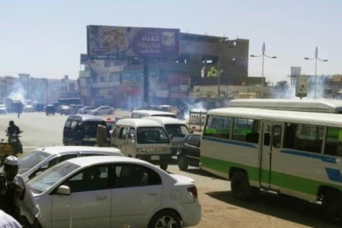 Tear gas fumes erupt during a protest in the Sudanese capital Khartoum's twin city of Omdurman