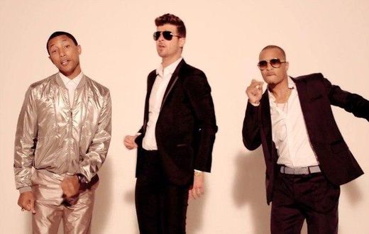Pharell Williams, Robin Thicke and T.I as shown in 'Blurred Lines' video
