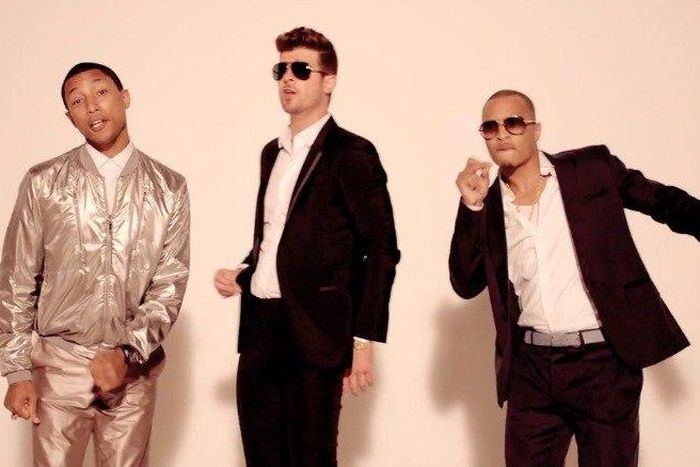 Pharell Williams, Robin Thicke and T.I as shown in 'Blurred Lines' video