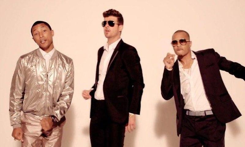 Pharell Williams, Robin Thicke and T.I as shown in 'Blurred Lines' video