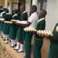 Students of Suubi Secondary and Vocational College in Lubanda, Lwengo District of Uganda, contribute to the payment of their own school fees by bringing five eggs a day to school