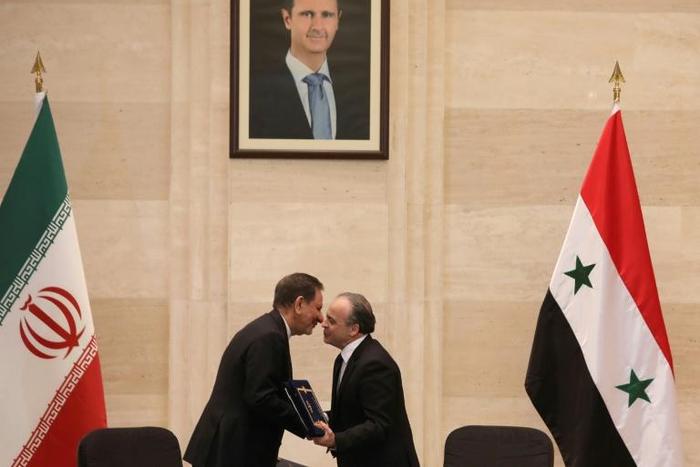 Syrian Prime Minister Imad Khamis (R, with Iranian First Vice President Eshaq Jahangiri) said the agreements included 'dozens of projects' in the oil sector and agriculture