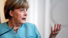 Merkel presses for European refugee response after weekend flood