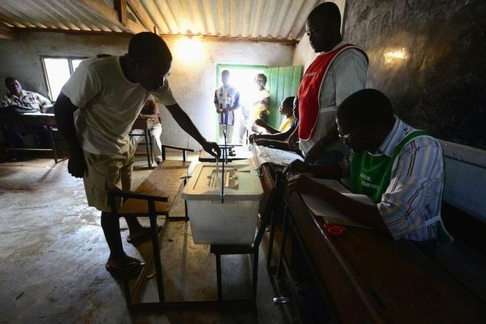 A man casts his ballot at a voting station in a file photo. REUTERS/Grant Lee Neuenburg
