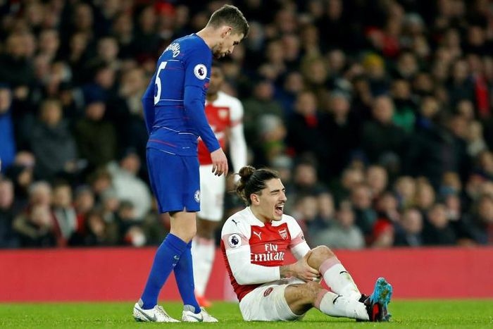 Arsenal defender Hector Bellerin reacts after picking up a knee injury against Chelsea
