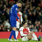 Arsenal defender Hector Bellerin reacts after picking up a knee injury against Chelsea
