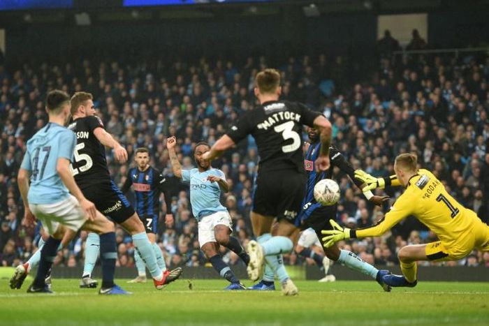 Opening strike: Raheem Sterling puts Man City ahead