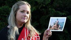 Caroline Waine of Woolton. Caroline had to withdraw from the Echo Win a Wedding Competition after the death of her fiancé, Stuart Murphy, from cancer. Pictured here with his Liverpool FC blanket and photograph