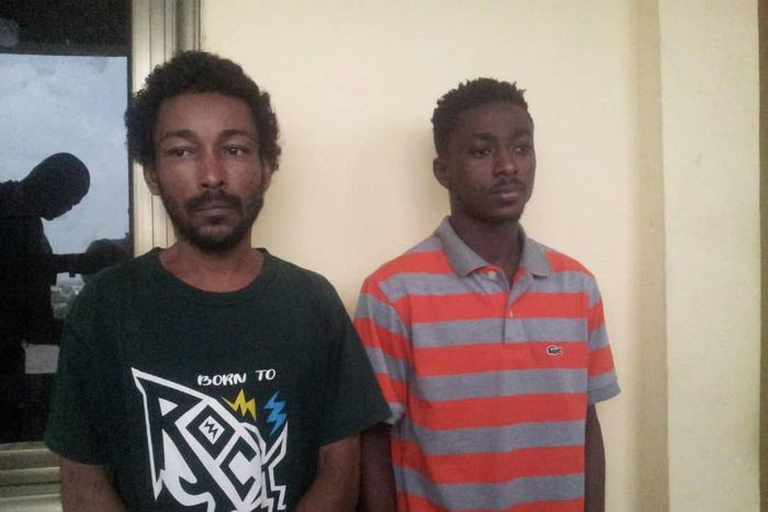 The suspects, Sam Akai (L) and Philip Larbi