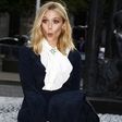 Elizabeth Olsen makes a funny face when she realized she was about to have a Marilyn Monroe moment