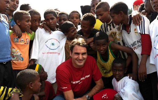 Roger Federer in South Africa with children supported by his Roger Federer Foundation