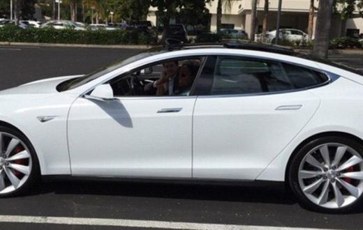 Oprah in her Tesla Model S