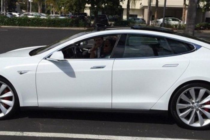 Oprah in her Tesla Model S