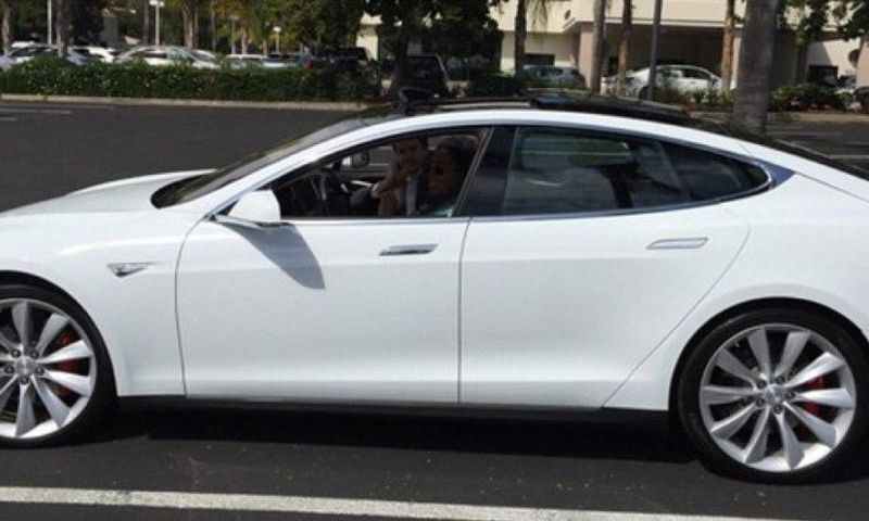 Oprah in her Tesla Model S