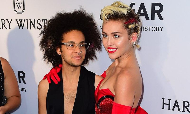 Tyler Ford and Miley Cyrus at the amfAR Inspiration Gala