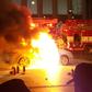 Photo by eyewitness Lee Sang-ho shows a burning taxi as a driver commits suicide near the US embassy in Seoul