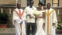 Mr and Mrs Ajibade with the priests