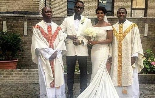 Mr and Mrs Ajibade with the priests