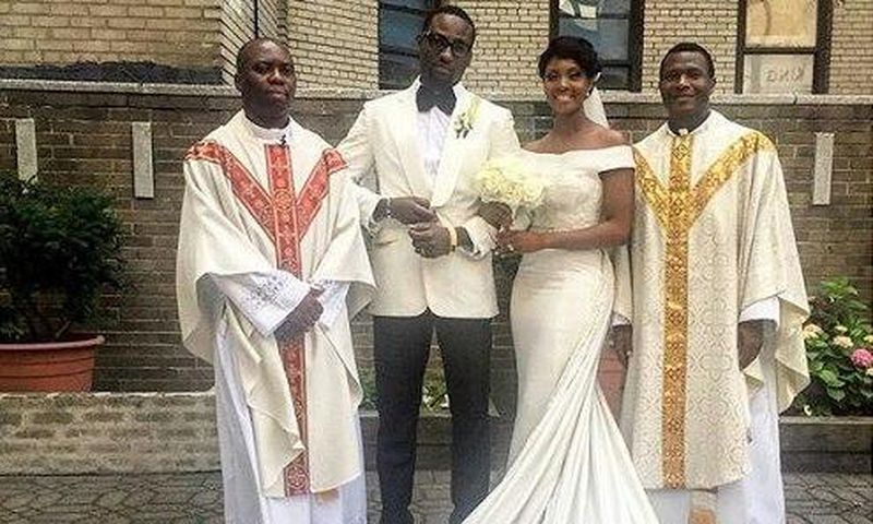 Mr and Mrs Ajibade with the priests
