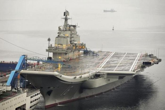 Lone aircraft carrier conducts drills as sea disputes fester