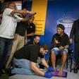 Brazil great Ronaldinho gestures during a ceremony to stamp his footprints at Maracana Stadium's Hall of Fame