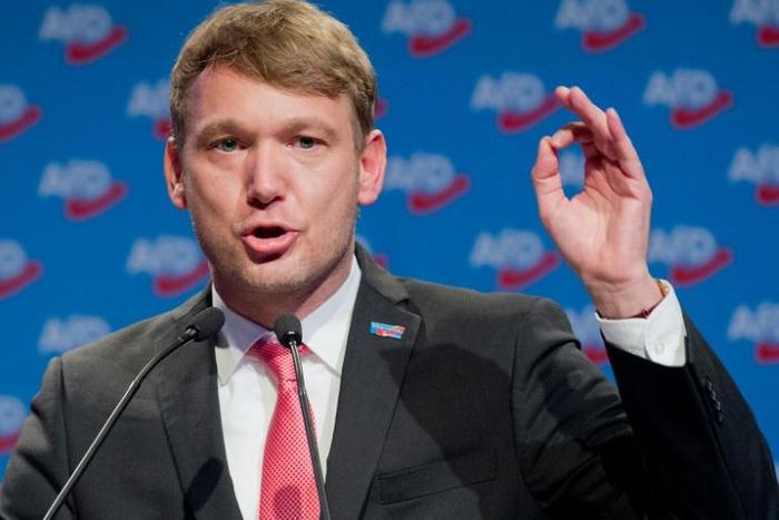 Poggenburg's new Facebook and Twitter profiles show a blue cornflower, the symbol used by Austrian Nazis during World War II