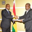 (File photo) Justice Senyo Dzamefe presenting the report to President John Mahama