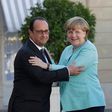 Socialist French president, Francois Hollande welcomes German Chancellor Angela Merkel