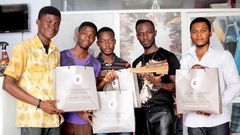 Winners of Okyeame Kwame's "Sing and Win Promo" contest receive prizes