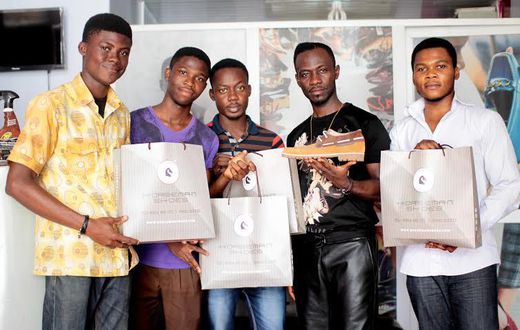 Winners of Okyeame Kwame's "Sing and Win Promo" contest receive prizes