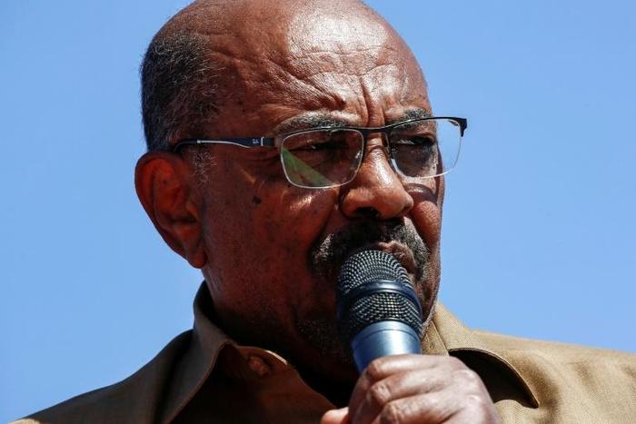 Sudanese President Omar al-Bashir addresses his supporters during a rally in the capital Khartoum on January 9, 2019