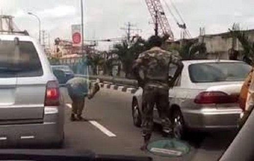 Soldier caught punishing a driver