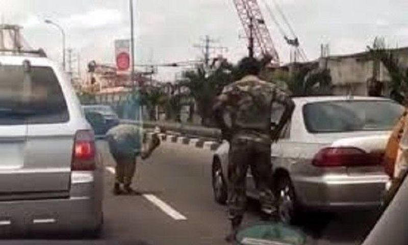 Soldier caught punishing a driver