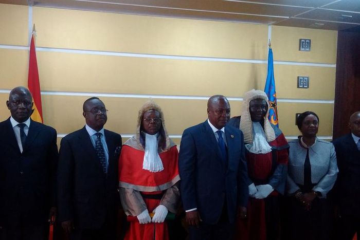 President Mahama with the judges [clad in red]