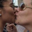A score of protesters shouted "Love is love! Love is love!" many of them kissing outside the huge Del Carmen church, symbolic for Panamanians as a gathering point for protests against 1980s dictator Manuel Noriega