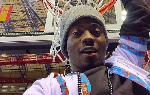 Korede Bello holding on to the rim