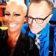 Amber Rose and Larry King enjoy a selfie together