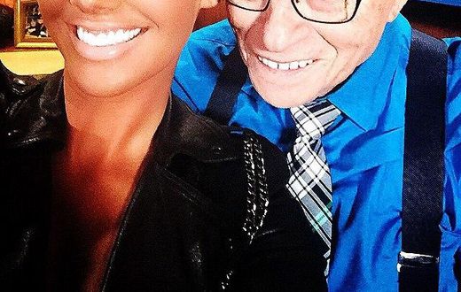 Amber Rose and Larry King enjoy a selfie together