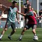 High steaks: Bayern Munich's Franck Ribery (left) in training in Doha on Saturday