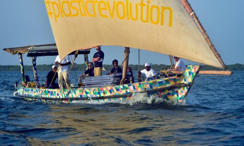 The boat is covered in a brightly-coloured patchwork of 30,000 flip-flops, which like the rest of the raw material was collected from Kenyan beaches and towns