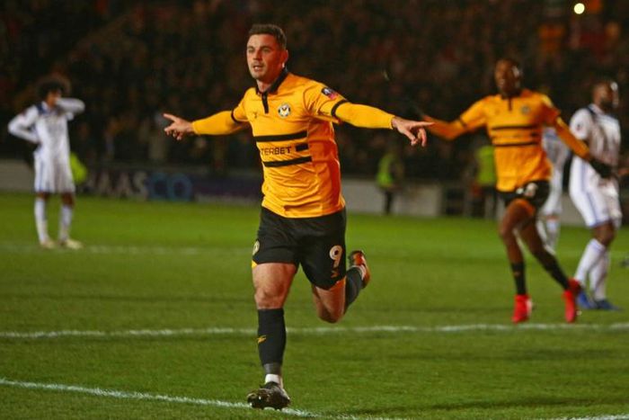 Padraig Amond celebrates after scoring the penalty that saw Newport County knock Premier League Leicester City out of the FA Cup with a 2-1 win in the third round at Rodney Parade on Sunday