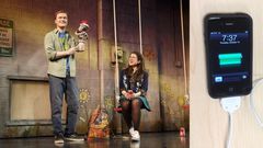 Left: The play continued after the disruption. Right: The iPhone the man tried to charge.