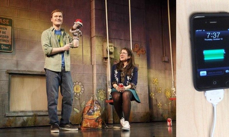 Left: The play continued after the disruption. Right: The iPhone the man tried to charge.