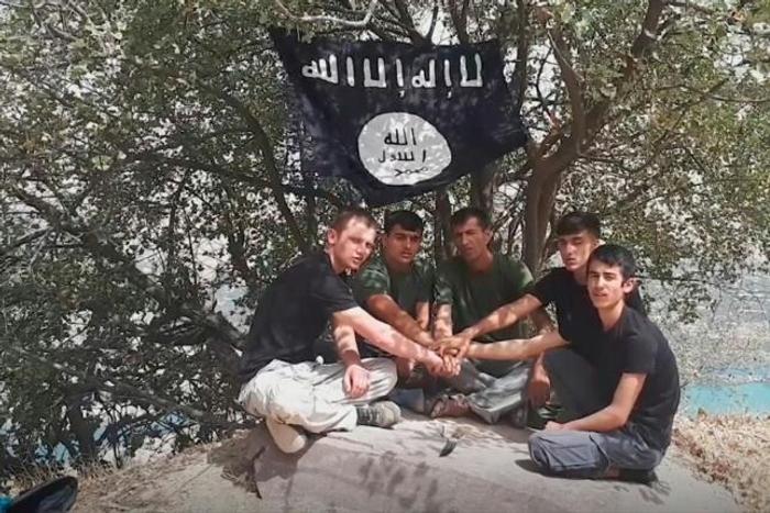 A image taken from a video released by The Islamic State's (IS) Amaq News Agency on July 31, 2018, allegedly shows the five executors of an attack on foreign tourists on a bike tour in southern Tajikistan