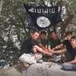 A image taken from a video released by The Islamic State's (IS) Amaq News Agency on July 31, 2018, allegedly shows the five executors of an attack on foreign tourists on a bike tour in southern Tajikistan