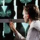 ___3961547___https:______static.pulse.com.gh___webservice___escenic___binary___3961547___2015___7___10___21____84156274_m4150291-doctor_examines_breast_mammograms_on_a_lightbox-spl