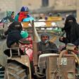 Civilians return to the town of Hajin in Syria's eastern Deir Ezzor province on January 27, 2019 after the Kurdish-led and US-backed Syrian Democratic Forces retook the city from jihadists of the Islamic State group