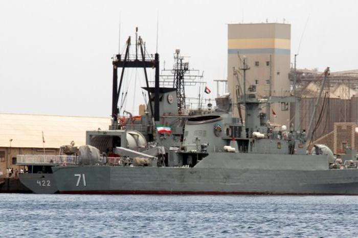 The Iranian frigate Alvand (R) docks in Port Sudan with supply ship Bushehr on May 6, 2014, one of a growing number of naval deployments outside the Gulf